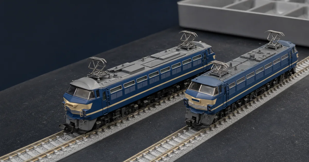 兩輛藍色奶油帶EF66風格電力機車模型的工作台比較情境